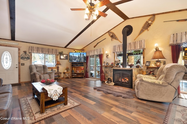 living room featuring hardwood / wood-style flooring, high vaulted ceiling, and ceiling fan