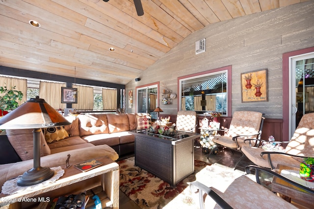 living room with vaulted ceiling and wooden ceiling