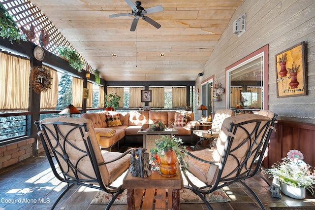 living room with lofted ceiling, wood ceiling, and ceiling fan