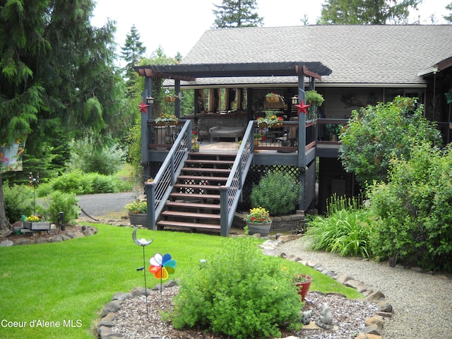 exterior space with a lawn and a deck