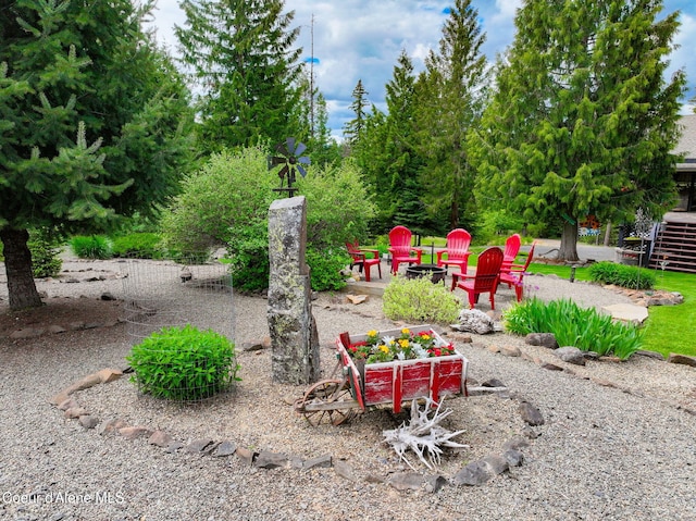 110 Shamrock Ln, Saint Maries, ID 83861 - view of yard featuring a fire pit
