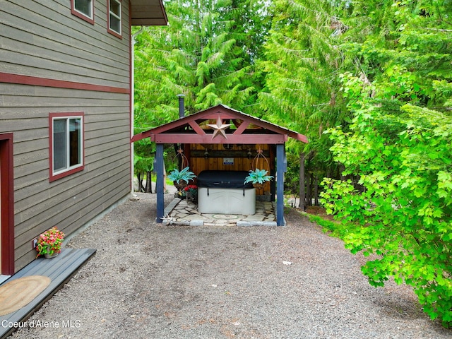110 Shamrock Ln, Saint Maries, ID 83861 - view of patio / terrace featuring a hot tub and a gazebo