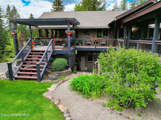 110 Shamrock Ln, Saint Maries, ID 83861 - rear view of property featuring a yard, stairs, a wooden deck, and roof with shingles