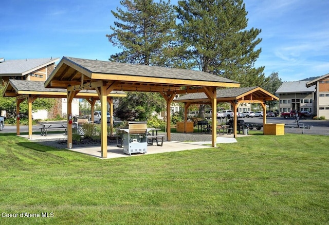 surrounding community featuring a yard and a gazebo