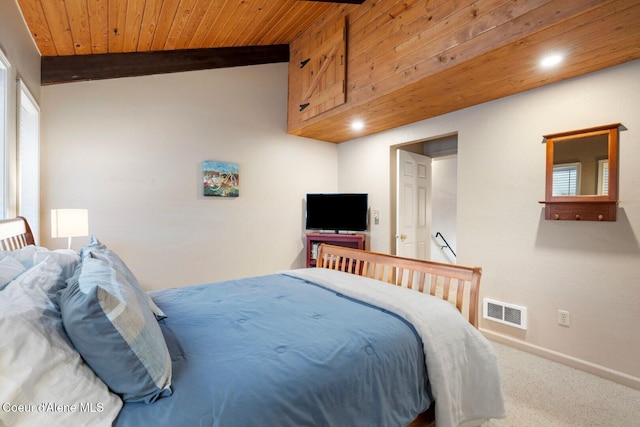 bedroom with baseboards, visible vents, wooden ceiling, beamed ceiling, and carpet flooring