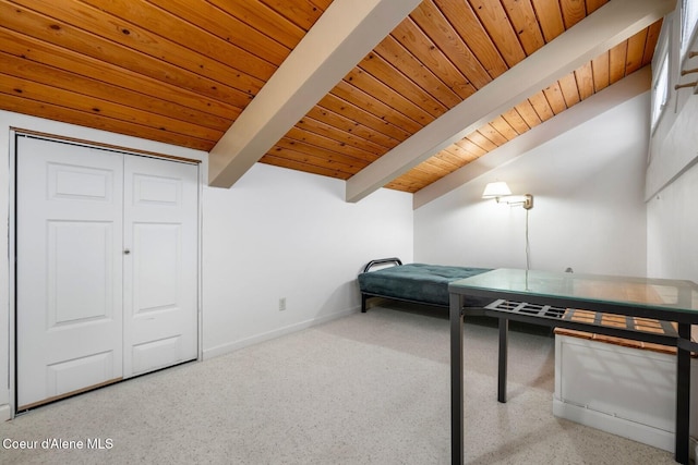 playroom with vaulted ceiling with beams, wood ceiling, and baseboards