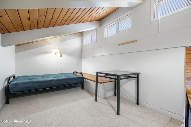 bedroom with lofted ceiling and wooden ceiling