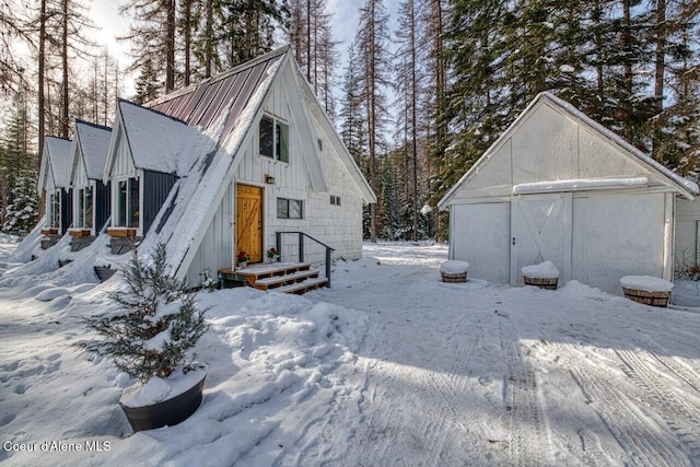 view of snow covered house