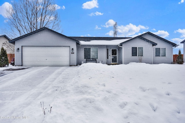 single story home featuring a garage