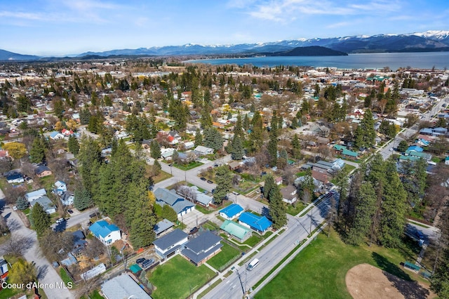 1108 Pine St, Sandpoint, ID 83864 - drone / aerial view featuring a water and mountain view and a residential view
