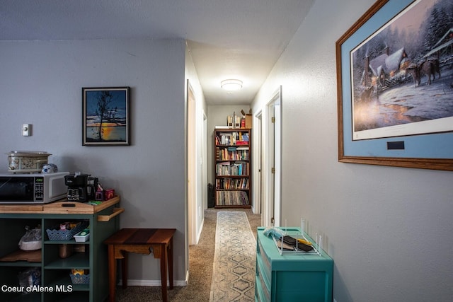corridor featuring carpet