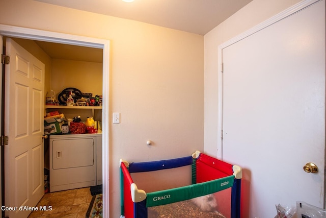 bedroom with washer / clothes dryer