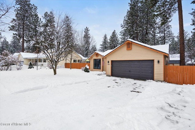 view of front of home with a garage