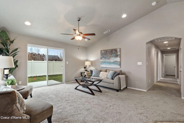 living room with light carpet, high vaulted ceiling, and ceiling fan