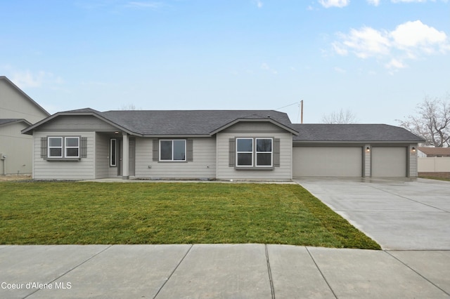 ranch-style house with a front yard and a garage