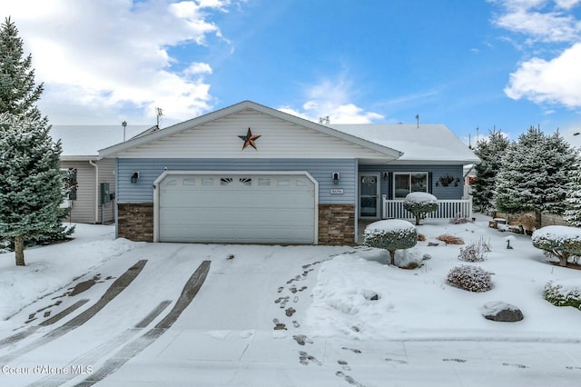 ranch-style home with a porch, stone siding, and an attached garage