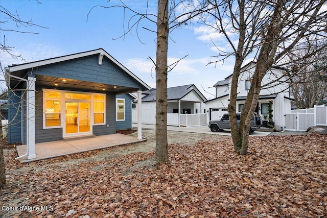 back of house with a patio area