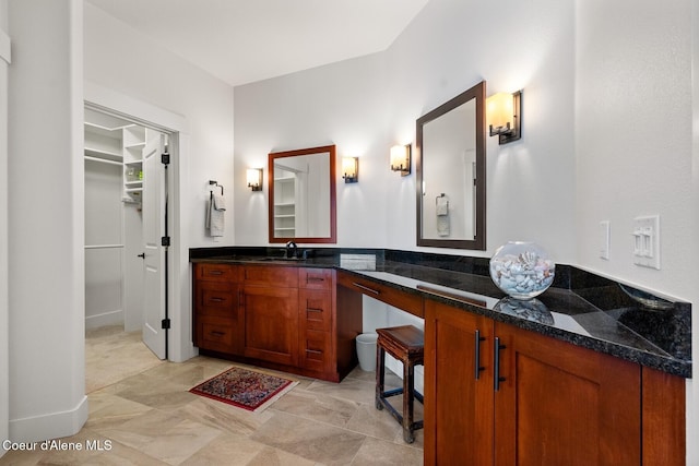 5006 S Brentwood Ln, Coeur Dalene, ID 83814 - bathroom with a spacious closet and vanity