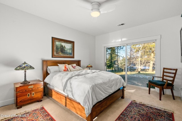 5006 S Brentwood Ln, Coeur Dalene, ID 83814 - bedroom with light carpet, visible vents, baseboards, ceiling fan, and access to exterior