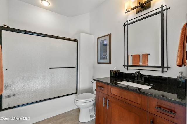5006 S Brentwood Ln, Coeur Dalene, ID 83814 - full bathroom featuring toilet, bath / shower combo with glass door, and vanity