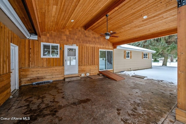 exterior space with a ceiling fan and a patio area