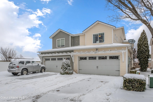 view of front of property featuring a garage