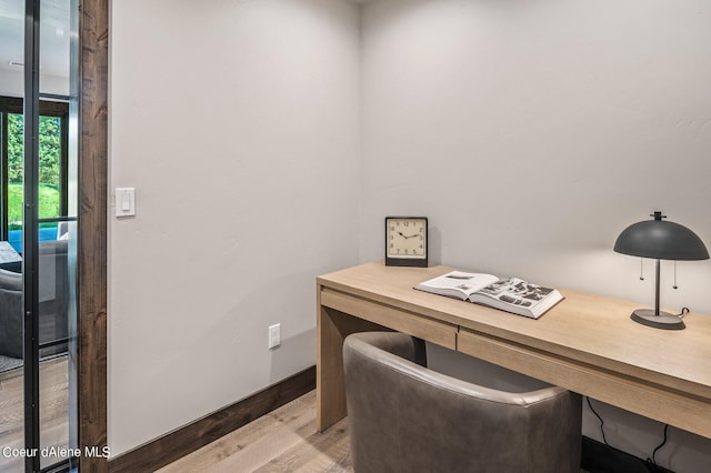 office area featuring light wood-type flooring