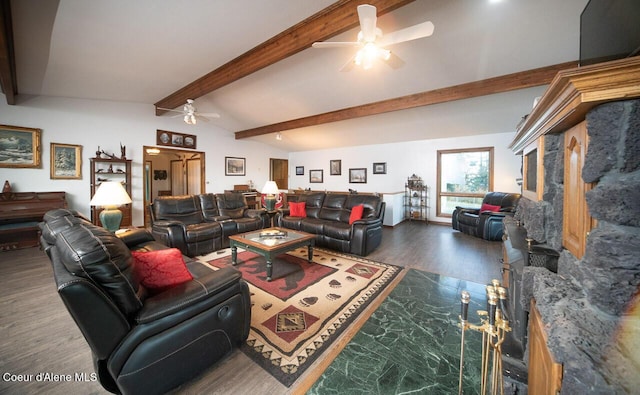 living room with lofted ceiling with beams, dark wood-type flooring, and a ceiling fan