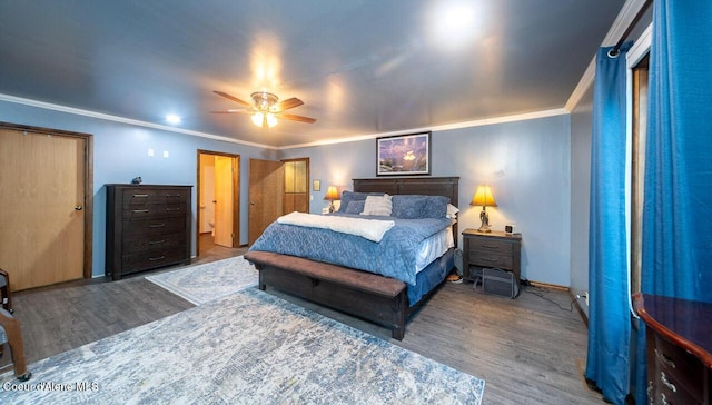 bedroom featuring crown molding, baseboards, ceiling fan, and wood finished floors