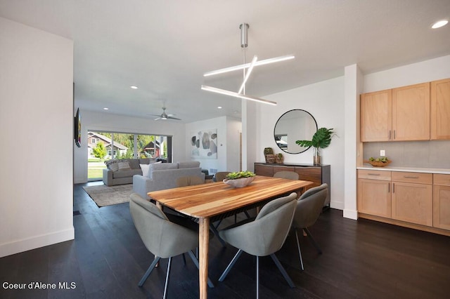 dining room featuring dark wood-style floors, recessed lighting, baseboards, and a ceiling fan