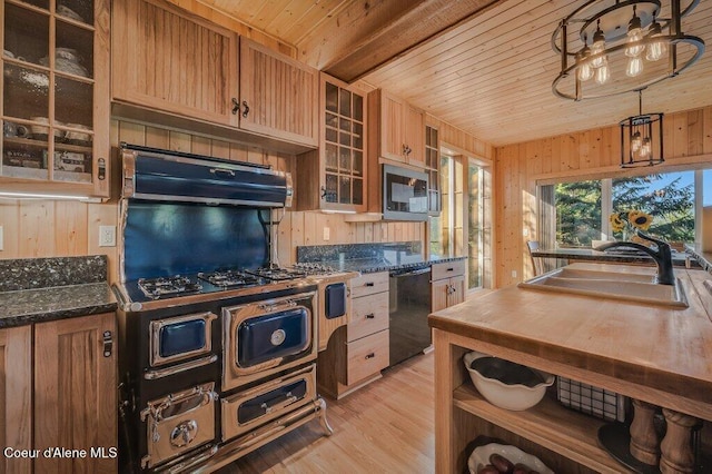 kitchen with wood walls, a sink, wood ceiling, light wood-type flooring, and dishwasher