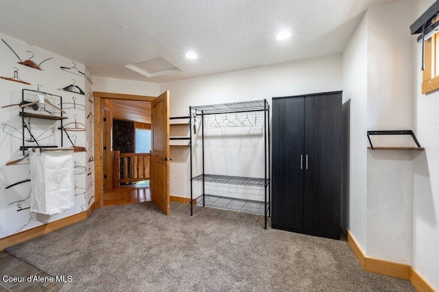 382 Blacktail Rd, Cocolalla, ID 83813 - unfurnished bedroom featuring carpet floors, a textured ceiling, and recessed lighting