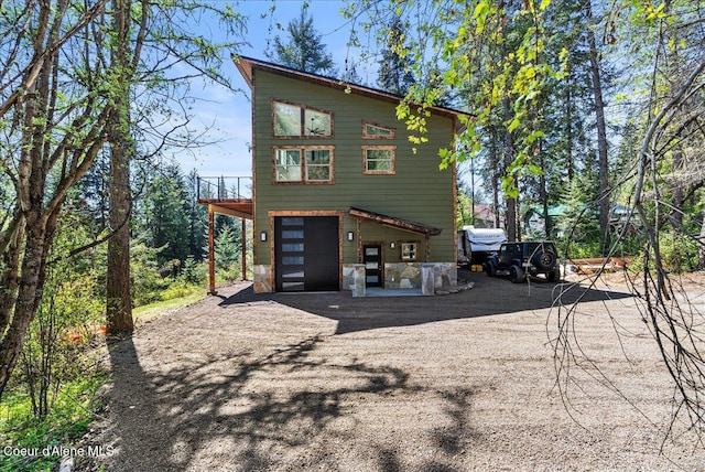 21941 S Lakeview Dr, Worley, ID 83876 - exterior space with a garage and driveway