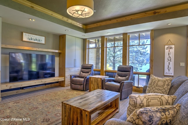 living room with a tray ceiling and recessed lighting