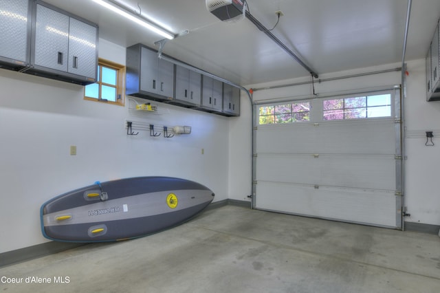 garage featuring a garage door opener