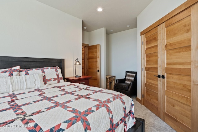 bedroom with carpet and recessed lighting