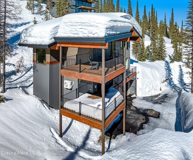 view of snow covered deck