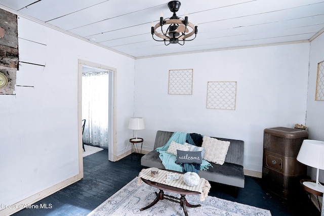 315 Montana St, Mullan, ID 83846 - sitting room featuring a notable chandelier, crown molding, baseboards, and wood finished floors