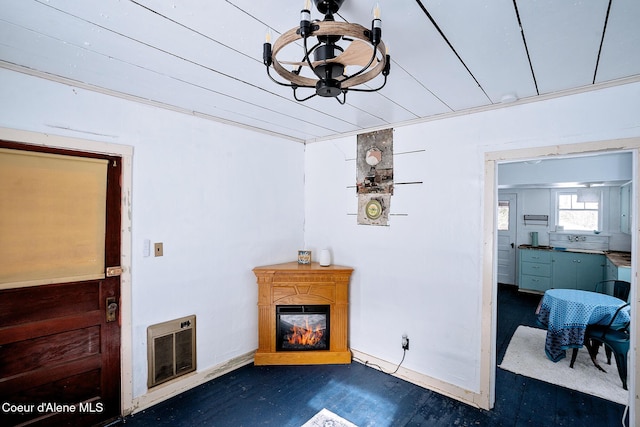 315 Montana St, Mullan, ID 83846 - interior space featuring a glass covered fireplace and heating unit