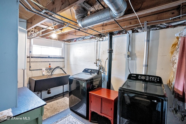 315 Montana St, Mullan, ID 83846 - below grade area with separate washer and dryer and a sink