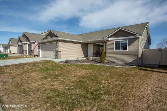 single story home with driveway, a front lawn, and an attached garage