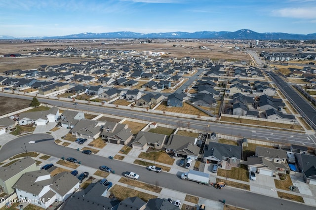 birds eye view of property featuring a residential view and a mountain view