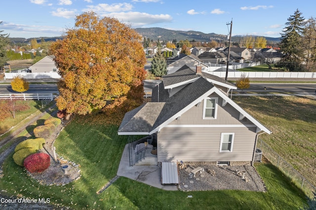 bird's eye view featuring a residential view and a mountain view