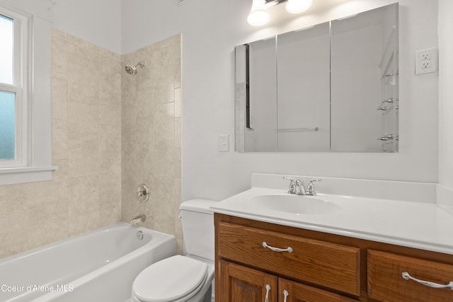 full bath with toilet, vanity, and bathing tub / shower combination