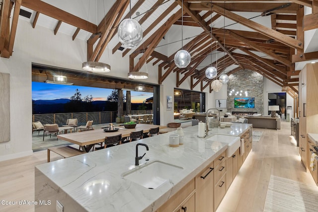 6895 S Gozzer Rd Unit A201, Harrison, ID 83833 - view of patio featuring an outdoor kitchen