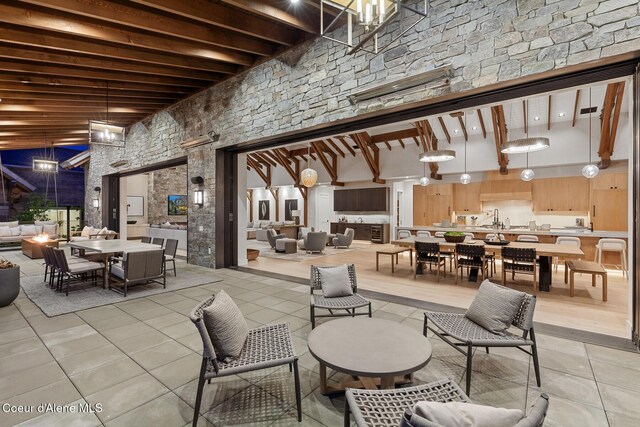 6895 S Gozzer Rd Unit A201, Harrison, ID 83833 - lobby with a towering ceiling, a sink, and beam ceiling