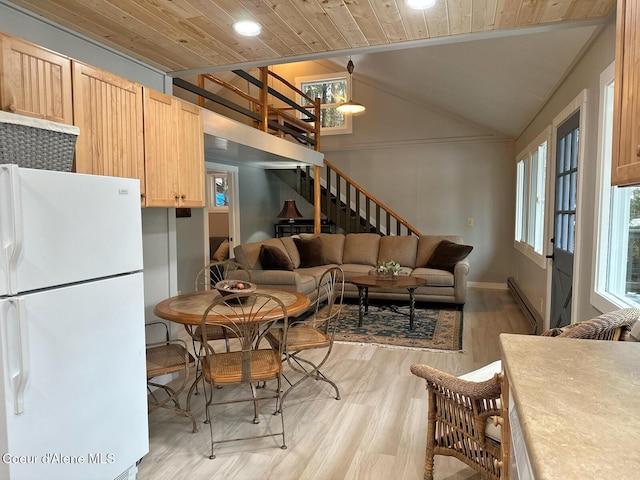 living room with lofted ceiling, stairway, light wood-type flooring, wooden ceiling, and baseboards