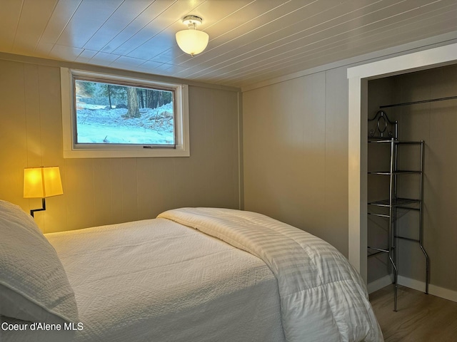 bedroom featuring a closet and wood finished floors