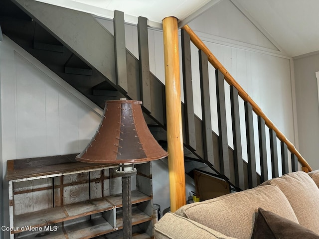 stairs with lofted ceiling