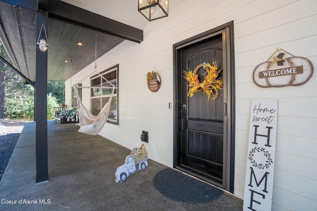 entrance to property with covered porch